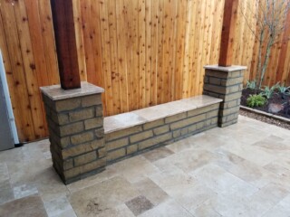 LLano Choprock stone bench with columns with English Walnut Travertine tops