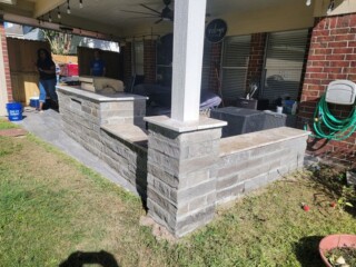 Charcoal chop rock capped with Nordic silver travertine