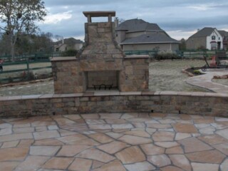 Oklahoma fireplace with sitting bench and Arizona flagstone patio