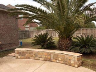 Oklahoma chop rock sitting wall with arizona buckskin tops.