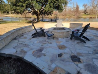 Limestone chop rock firepit with Oklahoma flagstone patio, limestone benches