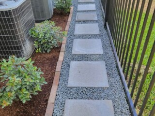 20x20 pewter color stepping stones with blackstar gravel
