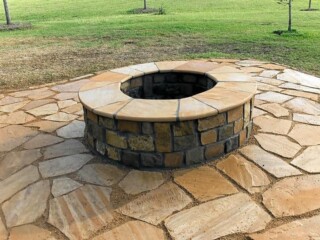 Oklahoma chop rock firepit with Arizona flagstone tops and I patio with granite gravel base and joints