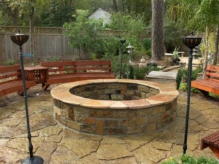 Oversize chop rock firepit with Arizona flagstone tops