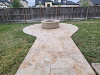 Ancient castle travertine patio with firepit