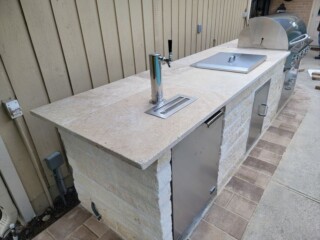 Bar on end of outdoor kitchen