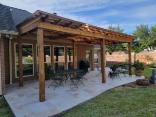 Cedar pergola with poly carbon roof