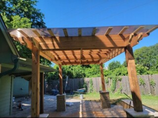 Cedar pergola with polycarbon roof