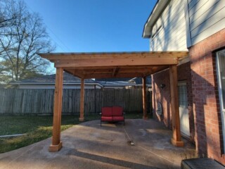 Cedar pergola with polycarbon roof