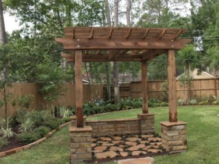 Cedar pergola with stone columns