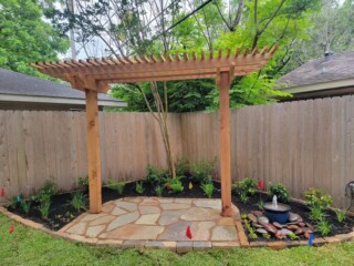 Cedar swing trellis with flagstone patio