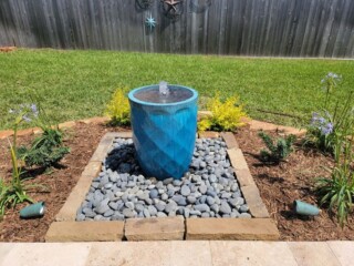 Ceramic jar disappearing water feature