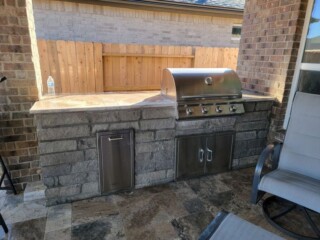 Charcoal chop rock capped with Nordic silver travertine