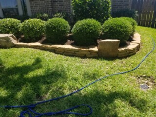 Dry stack 3 courses with moss boulders interims