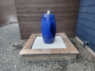 Glazed jar with mortared choprock surround, capped with Nordic silver travertine