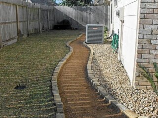 Granite gravel with chop rock borders