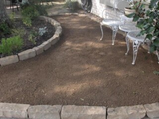 Granite gravel with chop rock borders