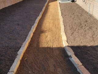 Granite gravel with choprock borders