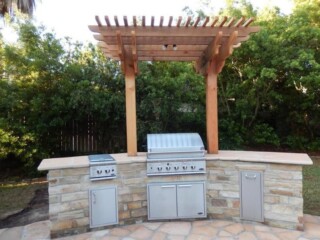 Kitchen with cedar cantilever pergola