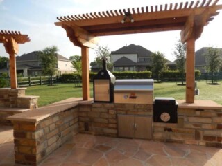 Kitchen with cedar cantilever pergola