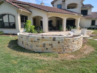Multi-sized limestone chop rock with dark accents