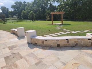 Multi-sized limestone chop rock with dark accents