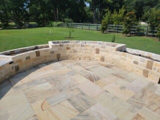 Multi-sized limestone chop rock with dark accents