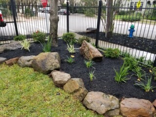 Multi-sized moss rock basket boulders