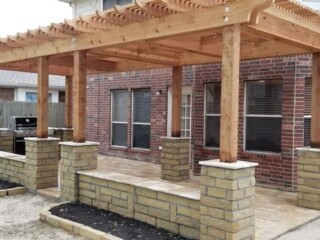 Cedar pergolas with stone benches and columns