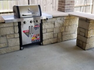 Multi-sized chop rock capped with light blend travertine