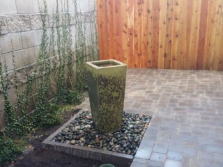Ceramic jar disappearing water feature