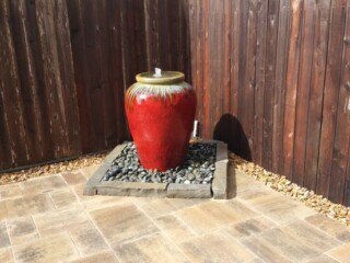 Ceramic jar disappearing water feature