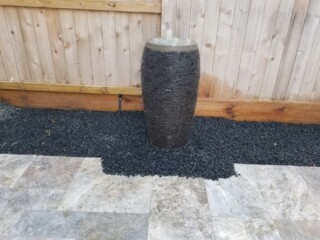 Stone veneer water feature